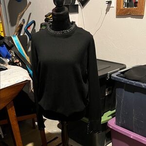 Lush Black Sweater with Embellished Neckline
